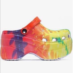 Size 11 4 inch multicolor platform clogs.